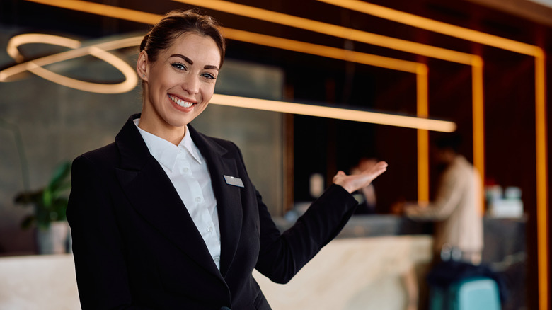 Concierge welcoming guests in a hotel.