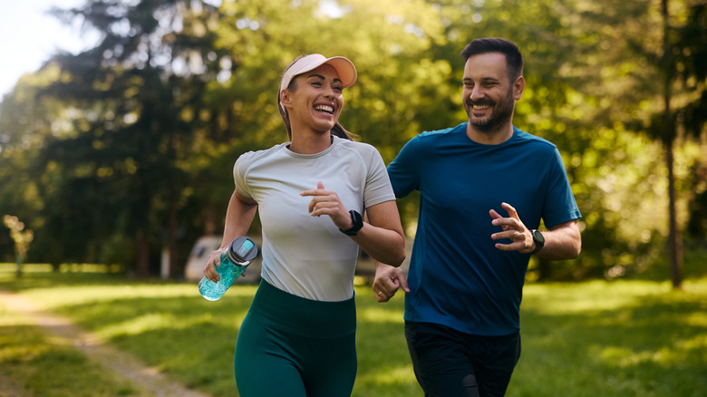 couple running in park