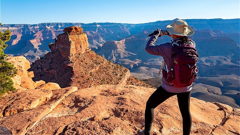 Person taking photos Grand Canyon