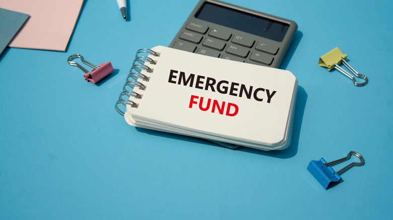 emergency fund written on notepad