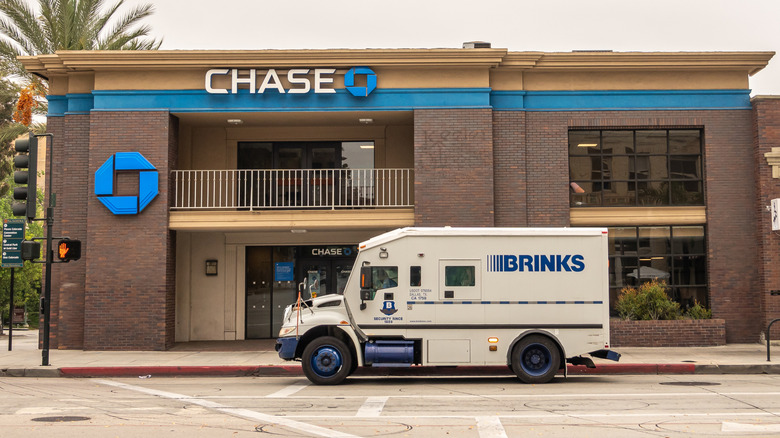 A Brinks truck parked in front of a Chase Bank branch