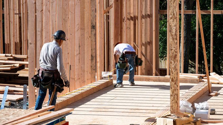 builders working on a house