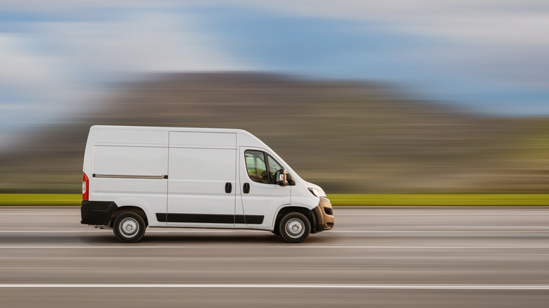 cargo van driving on highway