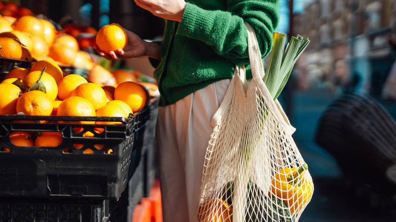 Person shopping for produce