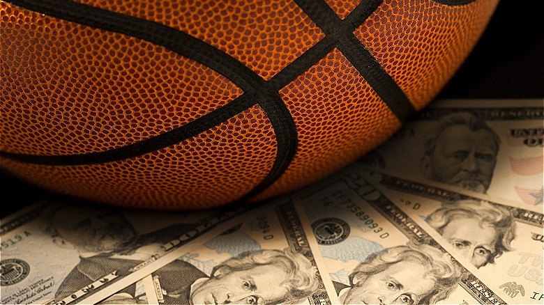 A basketball over U.S. money