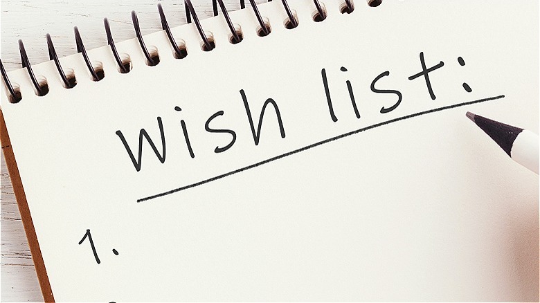 Notebook "wish list" with pen