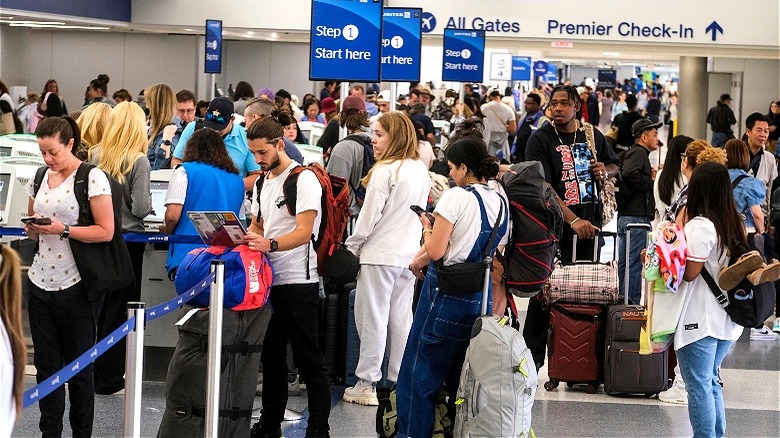 Line of people at airport