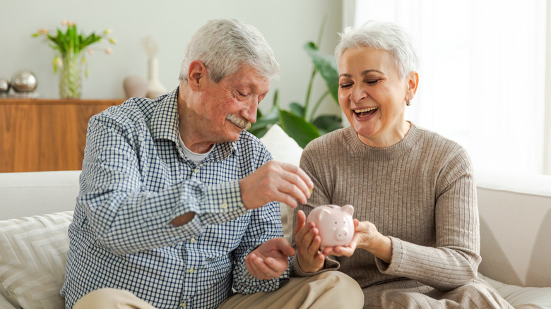 senior couple continuing to save