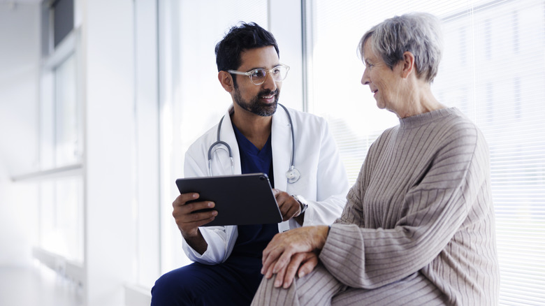 senior visiting her doctor