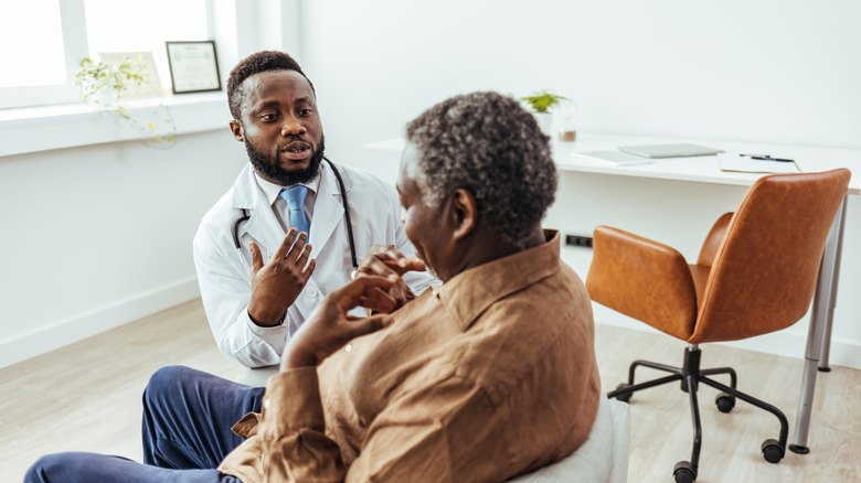 senior visiting her doctor