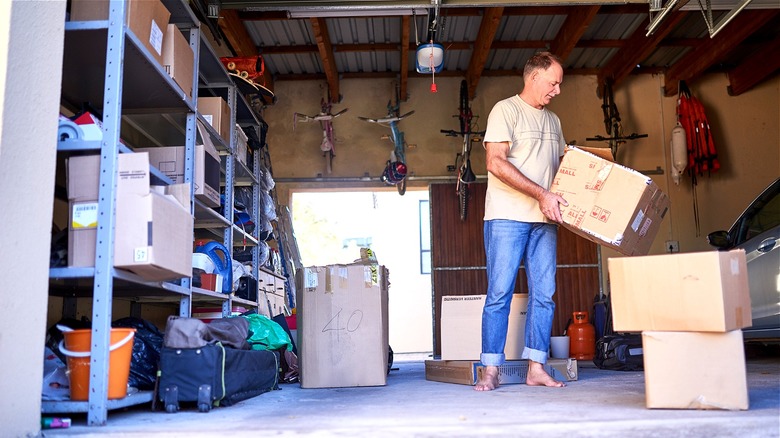 Person clearing out home garage