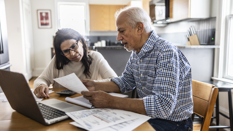 Older couple looking over documents