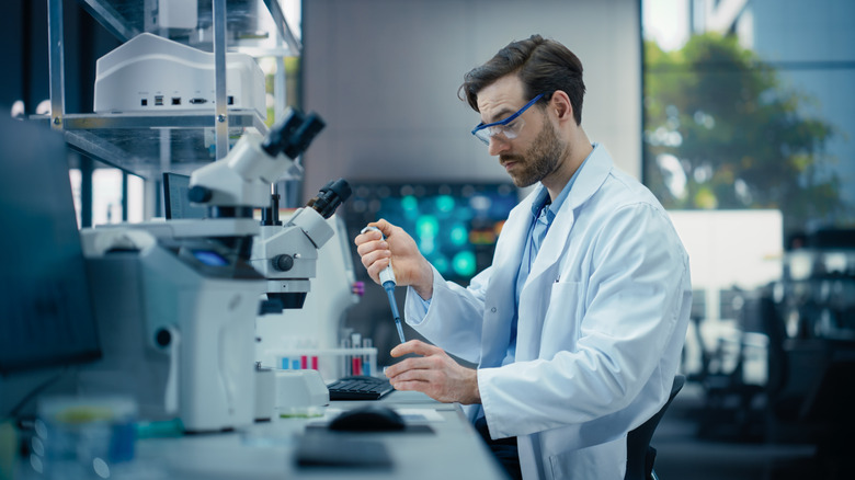 Young male scientist working in a lab