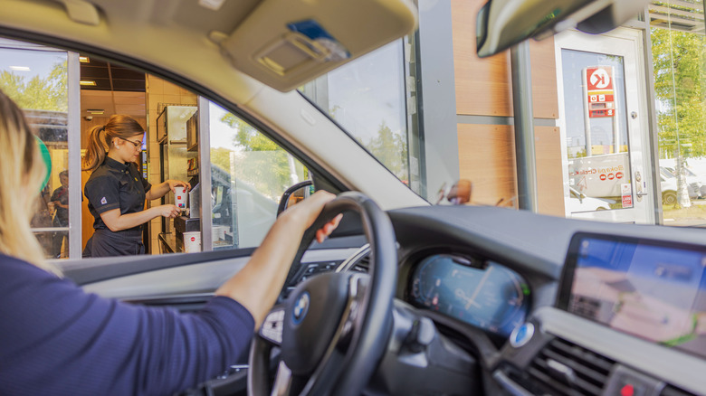 Woman at a McDonald's drive through window