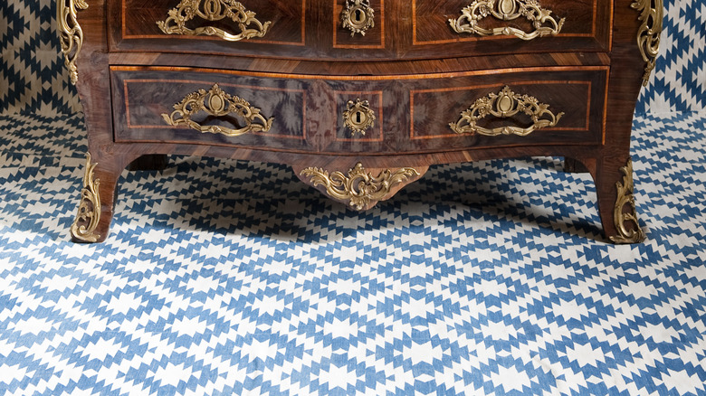 Louis XV kingwood parquetry bombe commode with ormolu mounts and grey marble