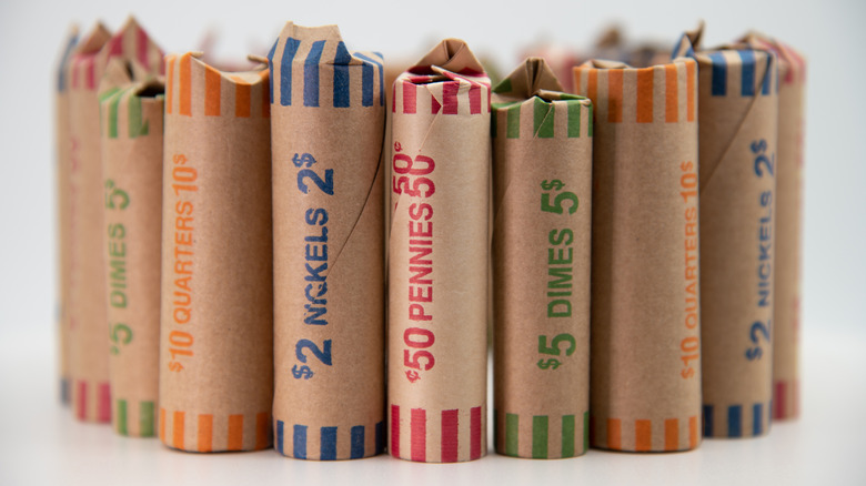 Miscellaneous rolls of coins wrapped in paper