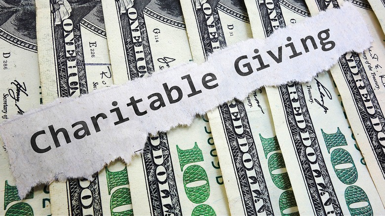 "Charitable Giving" note with money
