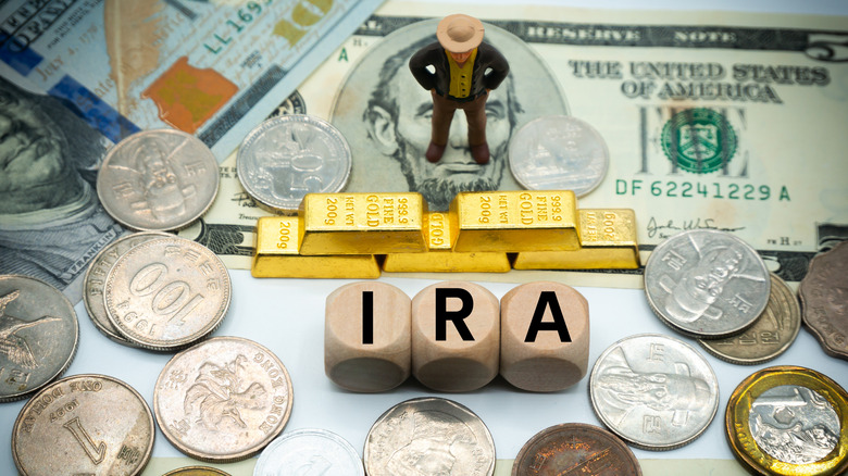 IRA in blocks and a variety of coins and gold bars