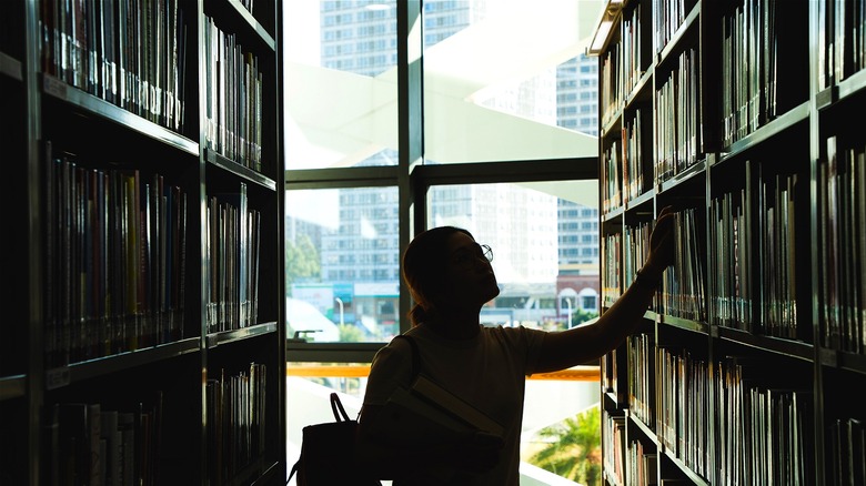 Student in university library