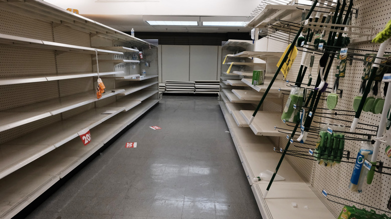 Empty shelves are seen at a Sears store on October 18, 2021