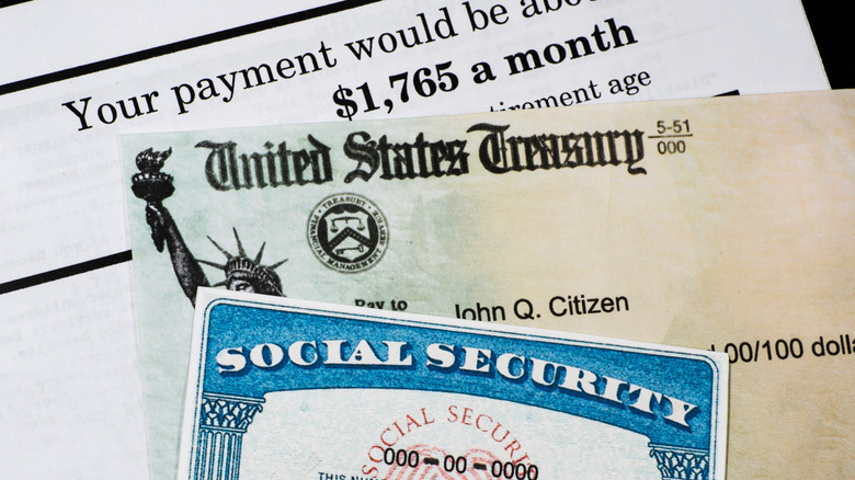 A Social Security card, a Social Security check, and a Social Security awards letter.