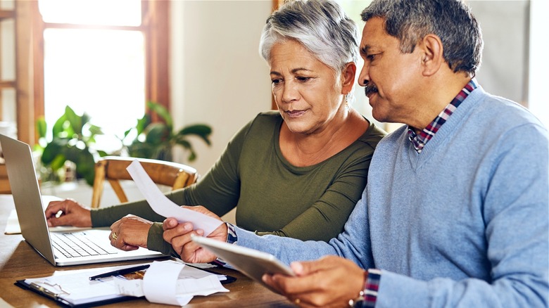 Retired couple reviewing finances