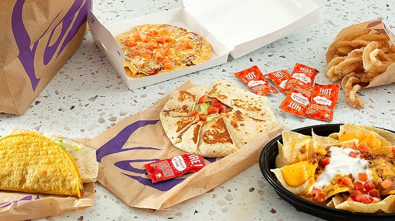 A Taco Bell combo deal is spread out on a terrazzo-covered table