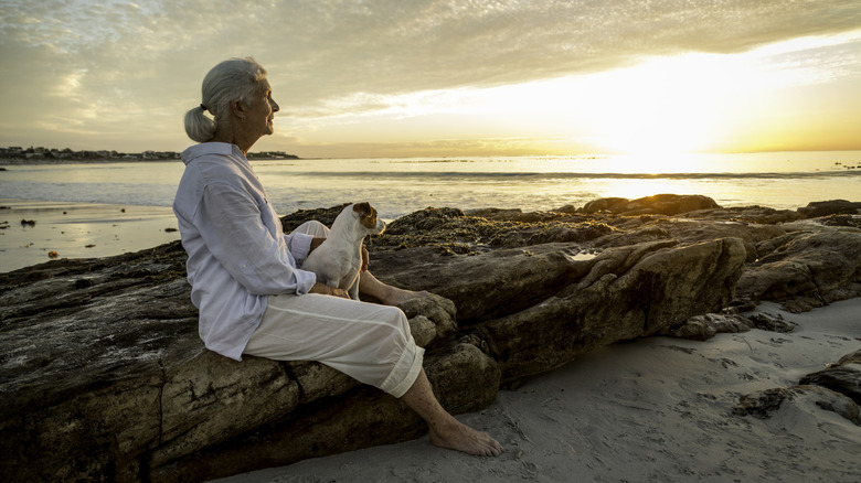 An elderly woman outside