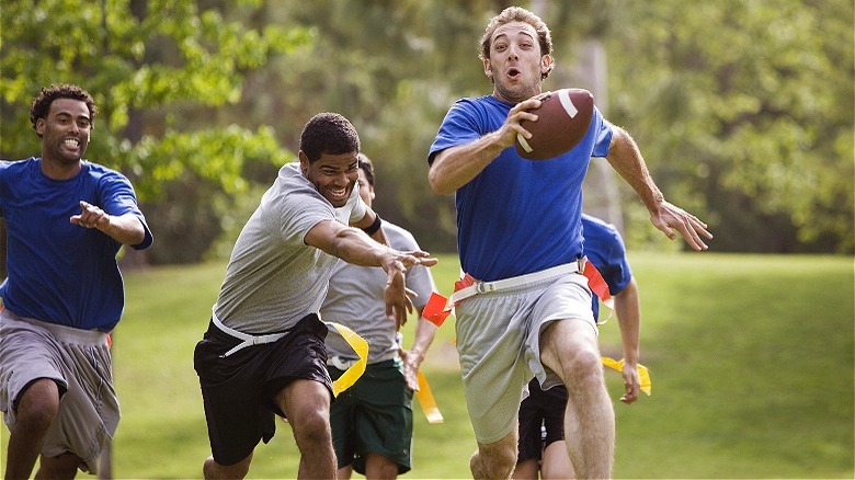 Friends playing flag football