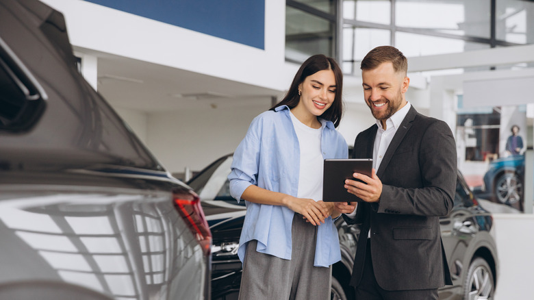 Woman buying car