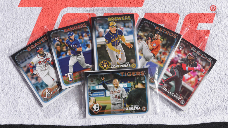 A detailed view of a group of Topps baseball cards on display