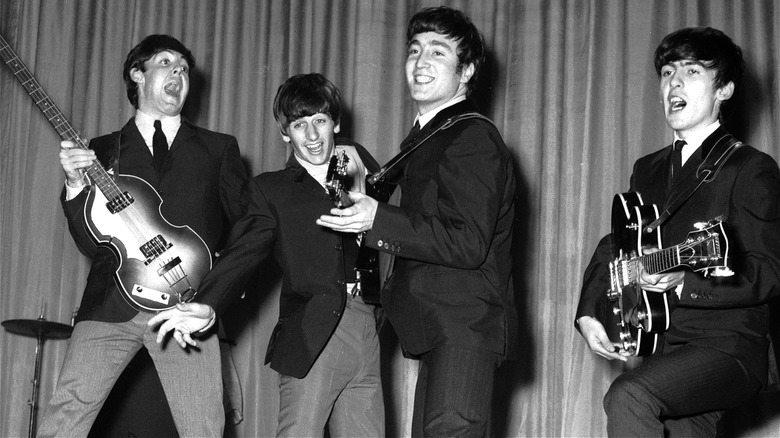 The Beatles performing in 1960s
