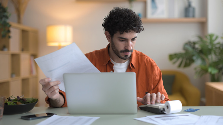 Man filing taxes