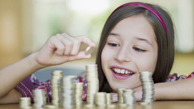 Girl counting coins
