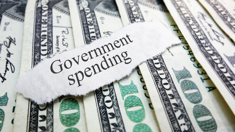 government spending and $100 bills