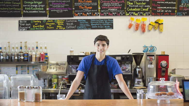 teenage worker at a cafe