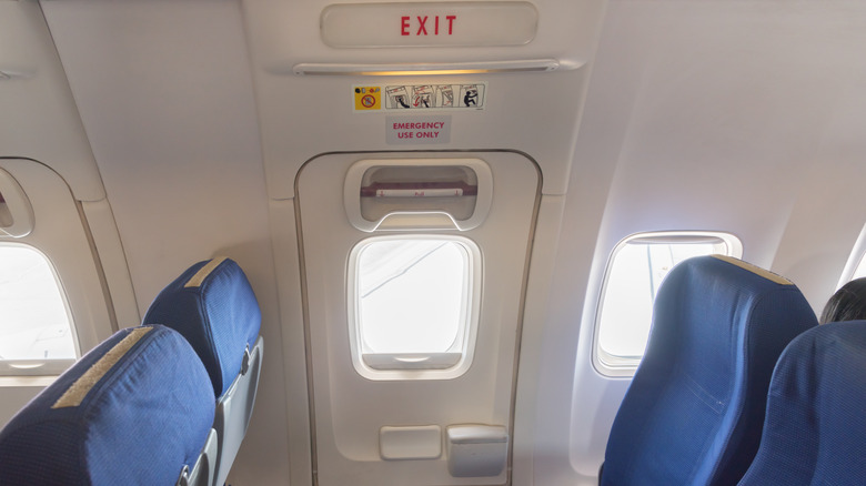 Exit row airplane seat