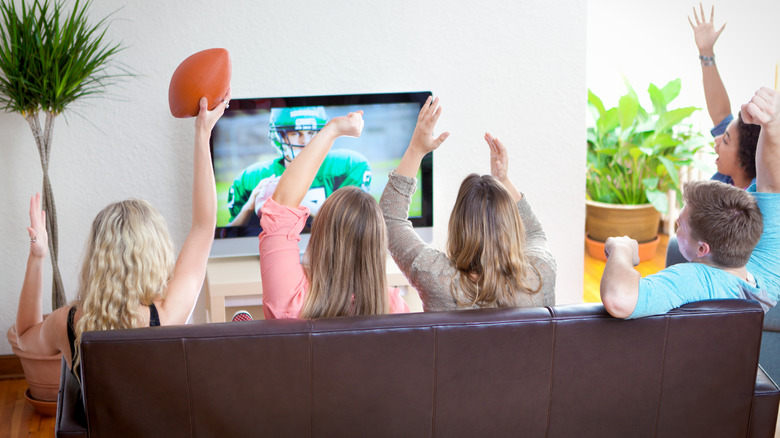 Group watching football on TV
