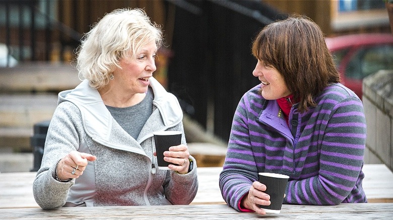 Friends having coffee and conversation