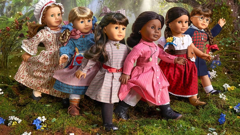 American Girl dolls in forest