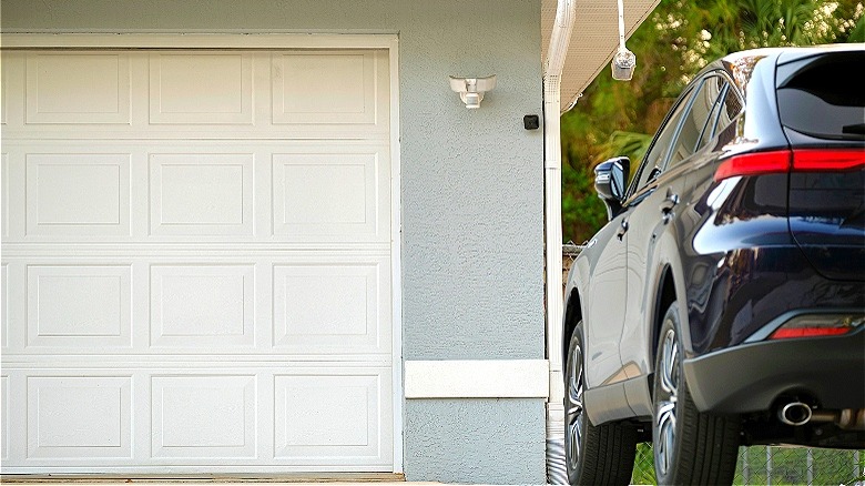 Garage door and car parked