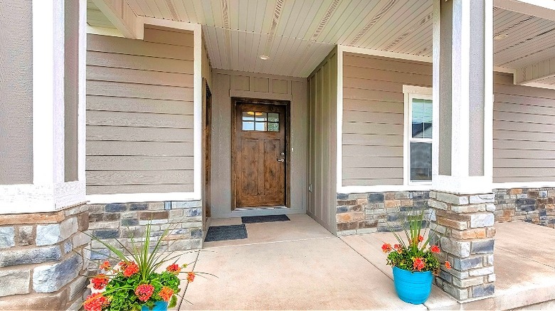 Home with stone veneer entryway