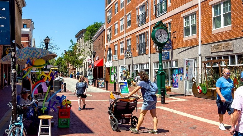 People walk through Salem neighborhood