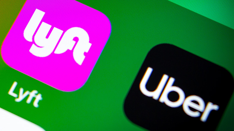 Lyft and Uber apps on a phone screen