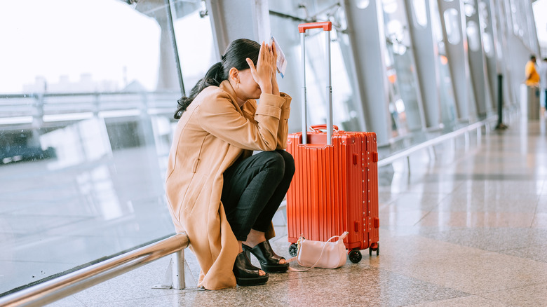 Emotionally upset traveler at airport