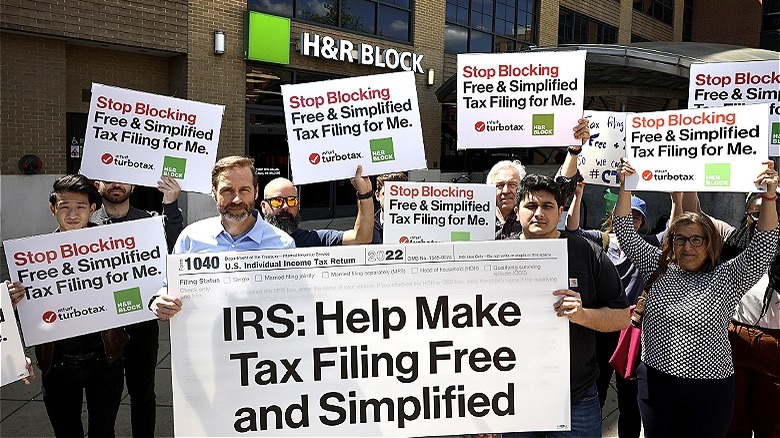 Protesting in front of H&R Block 