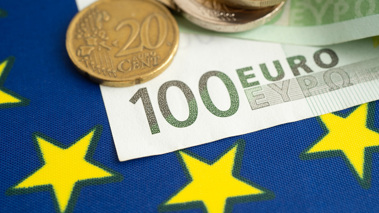 European Union flag with euro currency