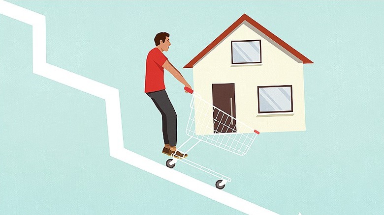 Graphic of person going down arrow with a house in a shopping cart