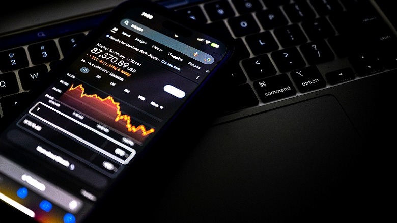 Smartphone displaying Bitcoin market summary