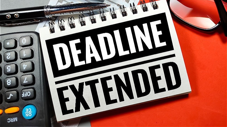 Notebook saying "Deadline Extended"